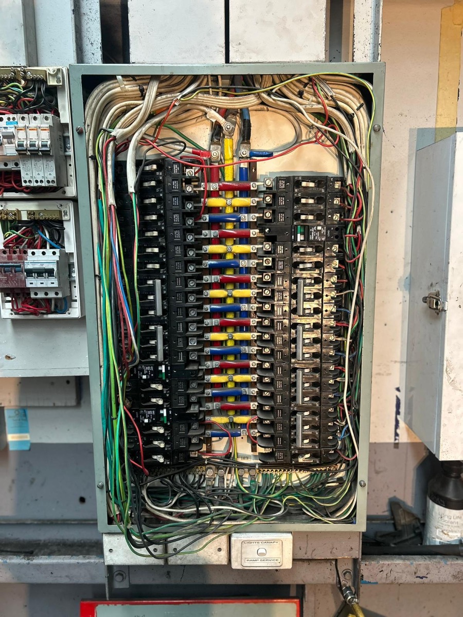 Fully wired multi-pole distribution board being serviced